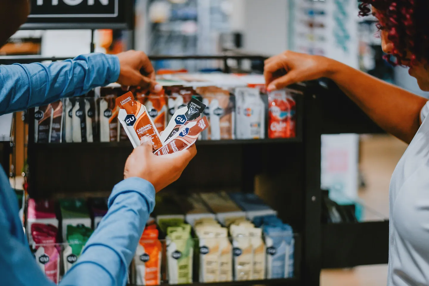 two people buying energy boosters